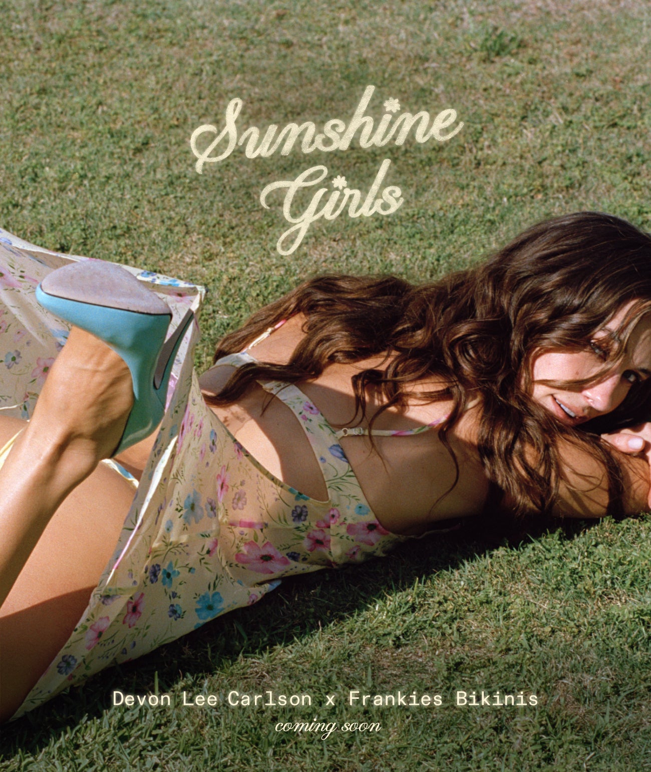 Devon lying on green grass wearing a floral bikini, with the text 'Sunshine Girls' and 'Devon Lee Carlson x Frankies Bikinis coming soon' overlaid on the photo.