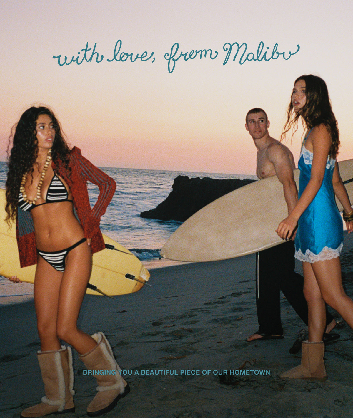 A beach lifestyle photograph from Malibu at sunset showing three people walking with surfboards. The text 'with love, from Malibu' appears at the top, and 'BRINGING YOU A BEAUTIFUL PIECE OF OUR HOMETOWN' appears at the bottom.