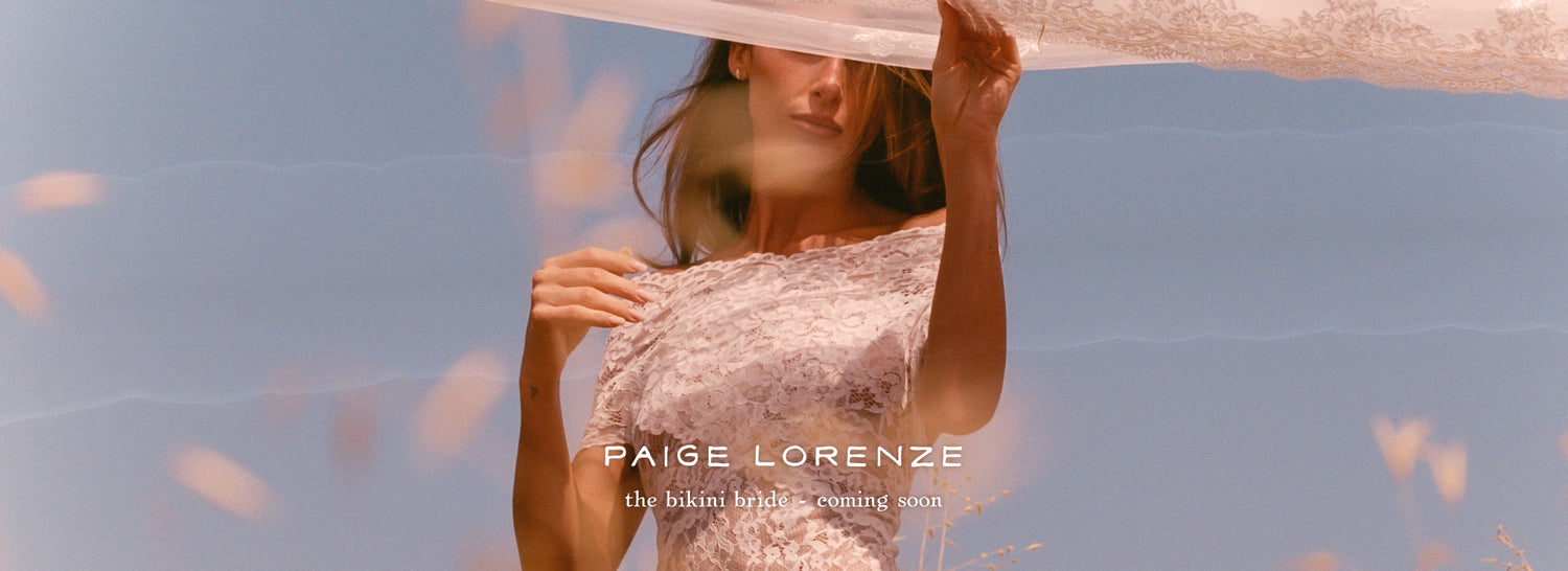 Woman holding a light fabric against a blurred background with 'Paige Lorenze' branding.