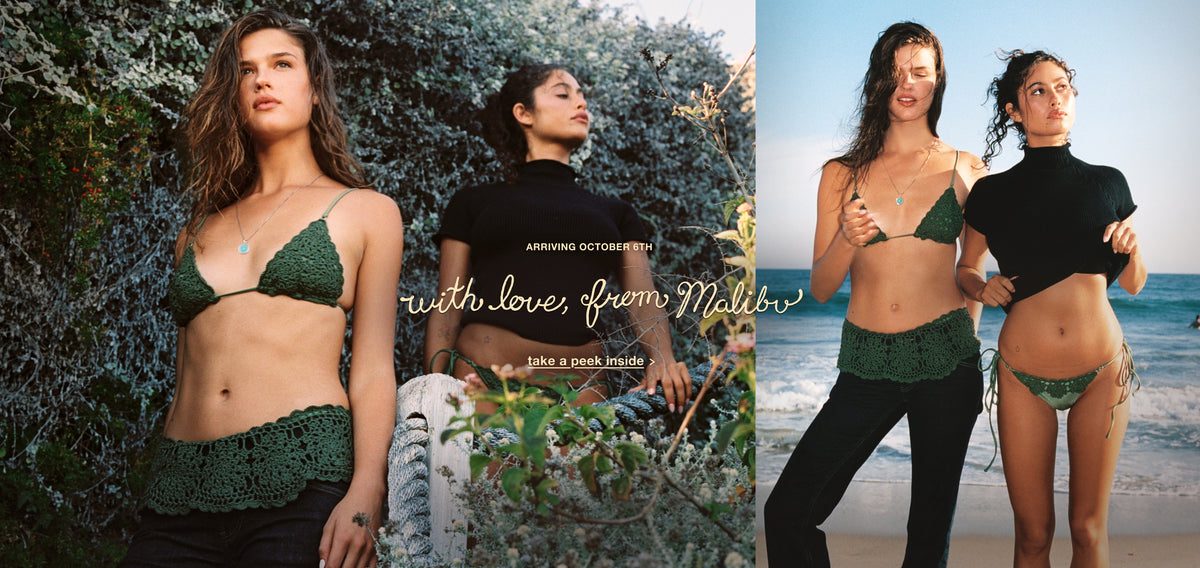 Promotional poster-style image of two women standing on a beach, one wearing a dark green bikini top and bottom with black pants, and the other wearing a black mock-neck crop top and green bikini bottom. The text at the top reads 'with love, from Malibu' and 'ARRIVING OCTOBER 6TH', with 'TAKE A PEEK INSIDE' at the bottom.