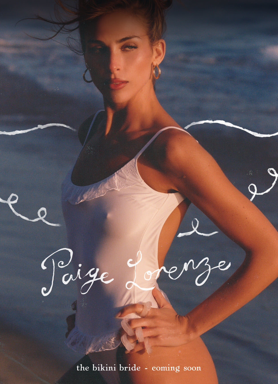 Woman in a white bikini with paige lorenze text overlay on a blue background